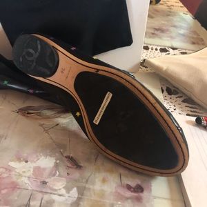Chanel shoes never been worn.  Size says 38.  Actually 7.5.